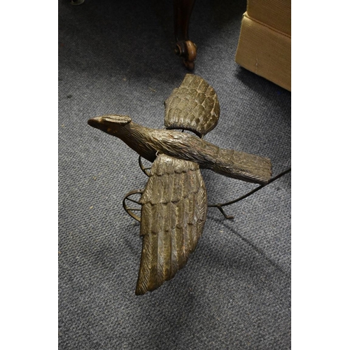 1745 - A stained wood and steel push-a-long automaton bird, with carved feather detail and flapping wings.... 