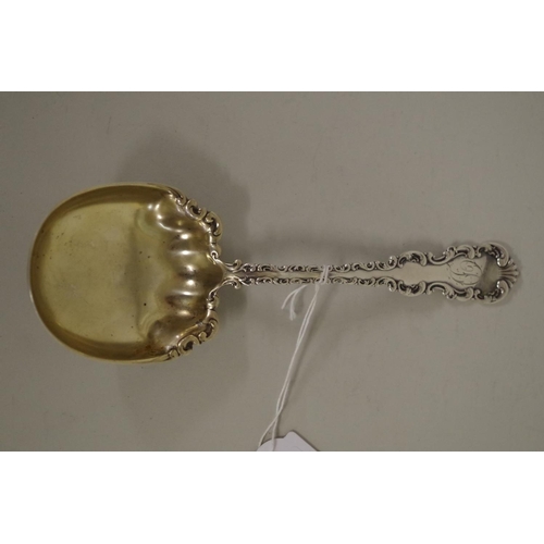 62 - An American serving spoon, by Whiting Manufacturing Co, stamped sterling, 21.5cm, 85g.... 