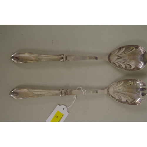 63 - A pair of EPNS servers, the handles stamped sterling, 28cm.