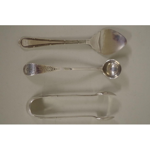 64 - A Victorian silver mustard spoon; together with a pair of silver sugar tongs and a silver preserve s... 