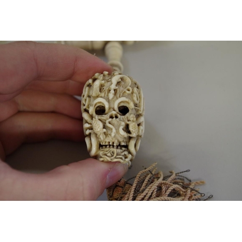 1597 - A very rare and important 16th century carved ivory 'Memento Mori' chaplet bead, carved as two back ... 