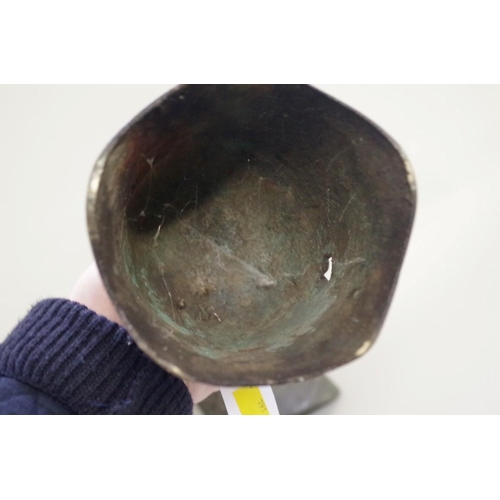 565 - A group of Chinese Archaistic style bronzes, comprising: a large twin handled tripod censer and cove... 