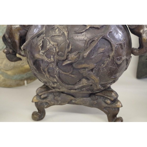 565 - A group of Chinese Archaistic style bronzes, comprising: a large twin handled tripod censer and cove... 