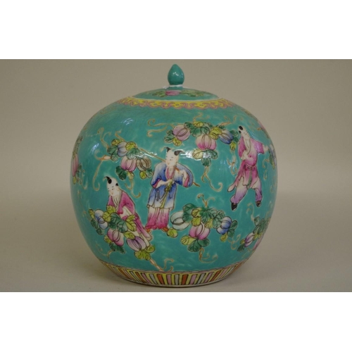 567 - A Chinese famille rose ovoid vase and cover, painted with seven boys, 21cm high. ... 