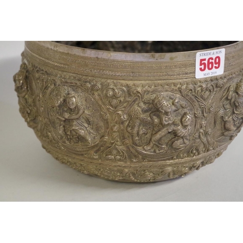 569 - An Indian white metal bowl, 19th century, embossed with panels of figures, 24cm diameter, 1157g.... 