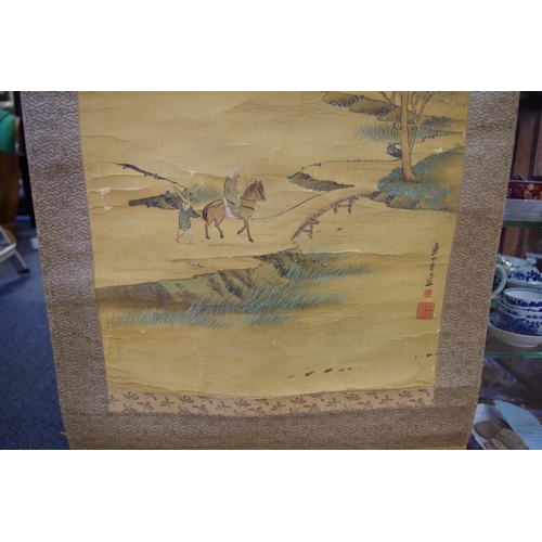 725 - A Chinese red silk panel, gilt painted with script, 190 x 35cm; together with three C... 