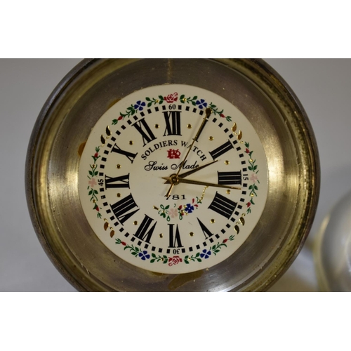 275 - A vintage 'Soldiers Watch' glass ball clock, having Swiss movement, stem wind, 65mm.... 