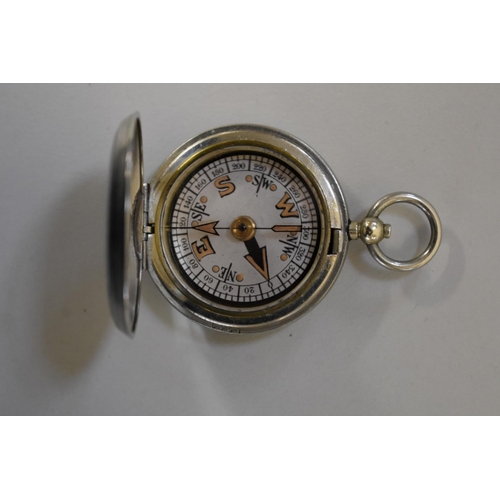 277 - A nickel plated pocket compass, stamped Dennison Birmingham VI 1918, 46mm.