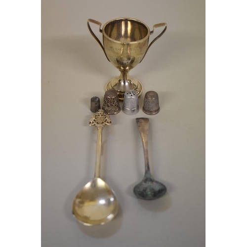 66 - A small silver trophy cup; together with other silver and metal items.