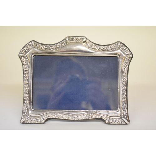 67 - A silver easel photograph frame, by R B B, Sheffield 1991, 18.5cm x 14.5cm.... 