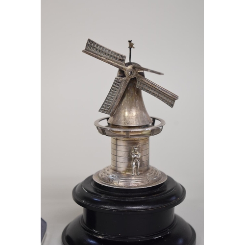 73 - A model of a Greek sailboat, stamped sterling 925; together with model windmill on wooden plinth.... 