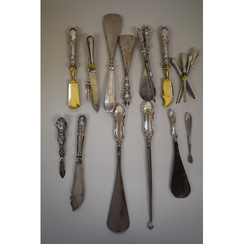 77 - A quantity of silver handled items.