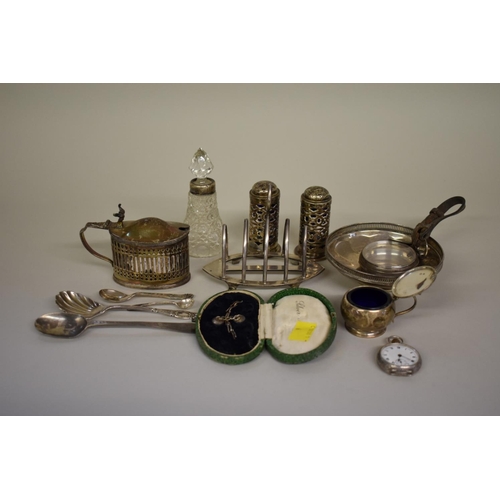 79 - A small collection of silver and metal items, to include: a toast rack; a mustard; a fob watch; and ... 