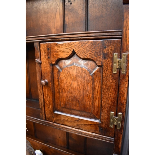 1217 - A reproduction oak panelled dresser and rack, 156cm wide.
