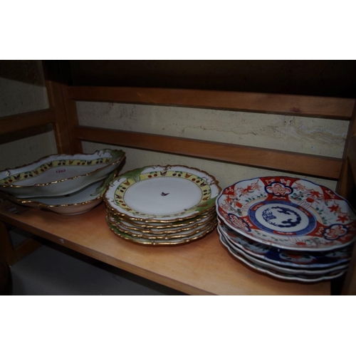 1252 - A Limoges porcelain part dessert service; together with four Japanese Imari plates.  ... 