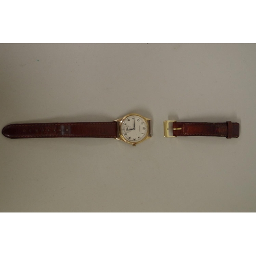 157 - A 1960s Garrard 9ct gold wristwatch, the signed silvered dial decorated Arabic numerals and subsidia... 