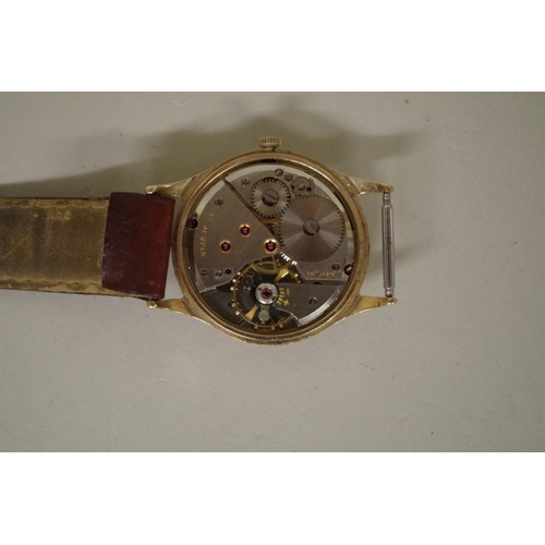 157 - A 1960s Garrard 9ct gold wristwatch, the signed silvered dial decorated Arabic numerals and subsidia... 