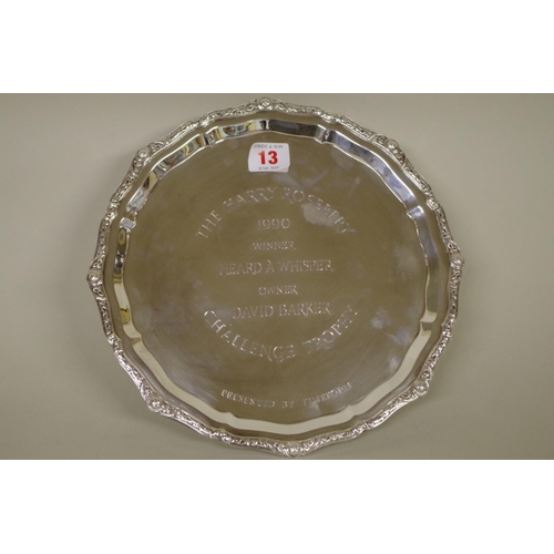 13 - WITHDRAWN FROM SALE - A silver circular presentation salver, by C J Vander Ltd, Sheffield 1988, on t... 