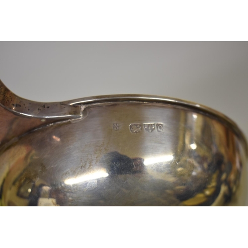 24 - A late Victorian silver quaich, by George Nathan & Ridley Hayes, Chester 1899, 20cm wide, 227g.... 