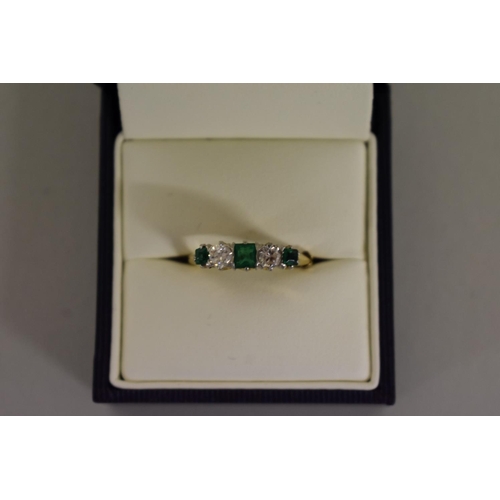 277 - A emerald and diamond five stone gold ring, hallmarked 18ct.... 