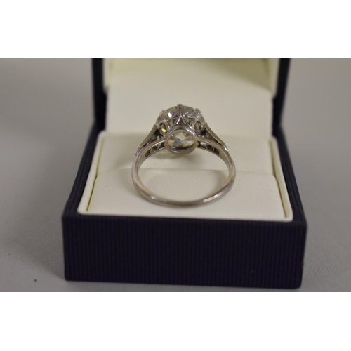 280 - A 4.8ct diamond and platinum ring, old European cut, colour J/K, clarity VS1/VS2, the shoulders set ... 