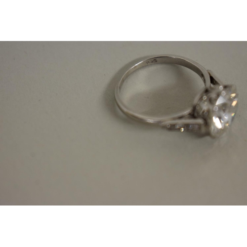 280 - A 4.8ct diamond and platinum ring, old European cut, colour J/K, clarity VS1/VS2, the shoulders set ... 