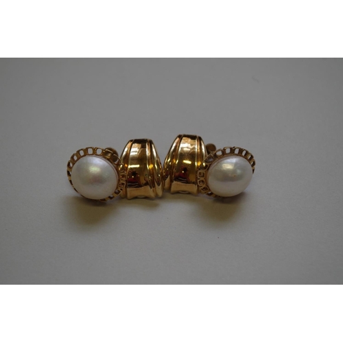 345 - A pair of unmarked gold ear clips; together with a pair stamped 9ct, 7.5g all in.