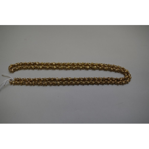 352 - A gold fancy link necklace, stamped 18ct, 81cm, 96.5g.