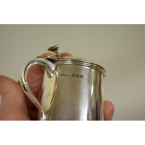 48 - A silver tankard form mustard, by Sydney Hall & Co, Sheffield 1933, with an unmatched silver mus... 