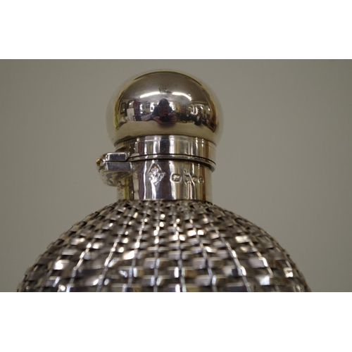 52 - A Victorian silver glass hip flask, having basket weave decoration, by George Betjemann &a... 