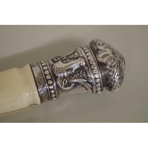 95 - A silver mounted bone handled four piece carving set.... 