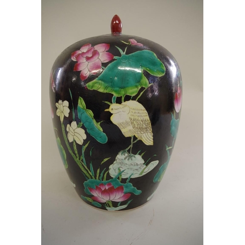 1309 - A Chinese black ground famille noir ovoid jar and cover, seal mark to base, 31cm high.... 