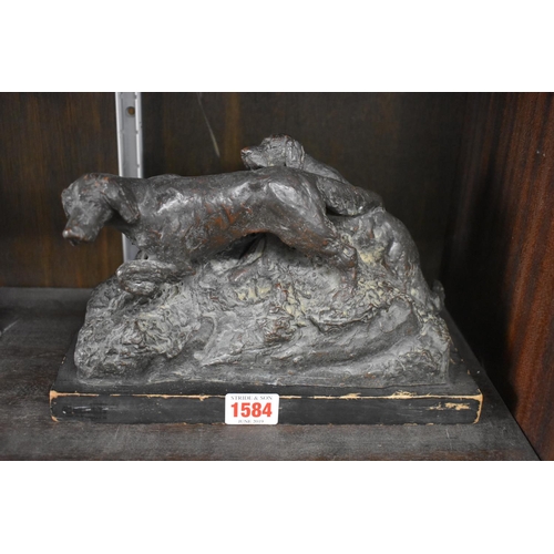 1286 - A bronzed figure group of two gundogs, inscribed 'GP', 23.5cm wide, on wood base.... 