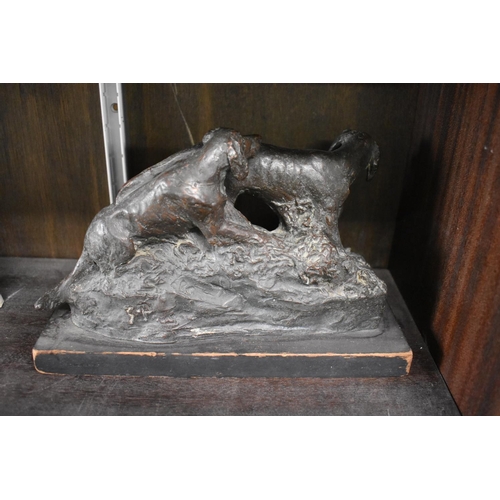 1286 - A bronzed figure group of two gundogs, inscribed 'GP', 23.5cm wide, on wood base.... 