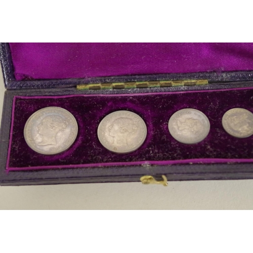 192 - Coins: a cased Victoria maundy money set, three  dated 1897, the one penny dated 1847.... 