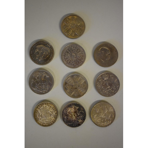 188 - Coins: ten British crowns, to include three silver examples; Victoria 1890; George V 1935; and Georg... 