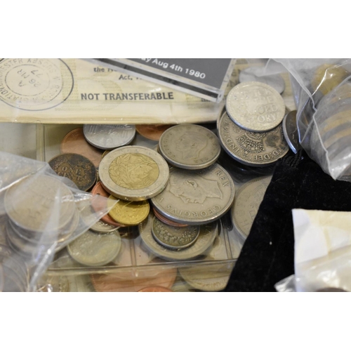 201 - Coins: a quantity of British coins and bank notes; together with a small quantity of US coins etc.... 