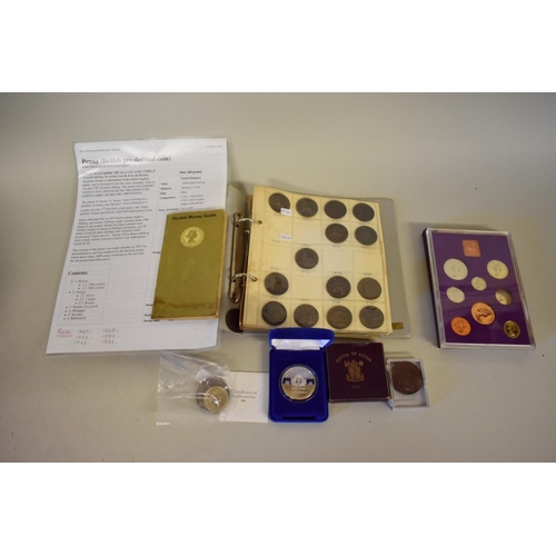 203 - Coins: a Royal Mint 'Coinage of United Kingdom' 1970 set; together with a cased Cunard QEII 50 year ... 