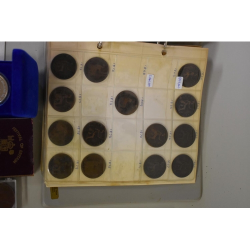 203 - Coins: a Royal Mint 'Coinage of United Kingdom' 1970 set; together with a cased Cunard QEII 50 year ... 