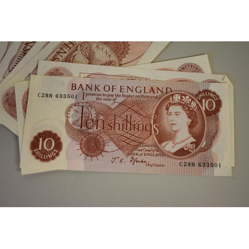 207 - Banknotes: twenty-five J S Fforde uncirculated ten shilling notes, all prefix C28N.