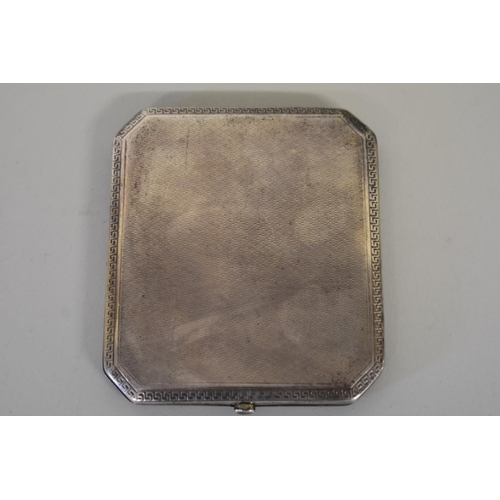 33 - A silver engine turned cigarette case, by Deakin & Francis, Birmingham 1919, 137g all ... 