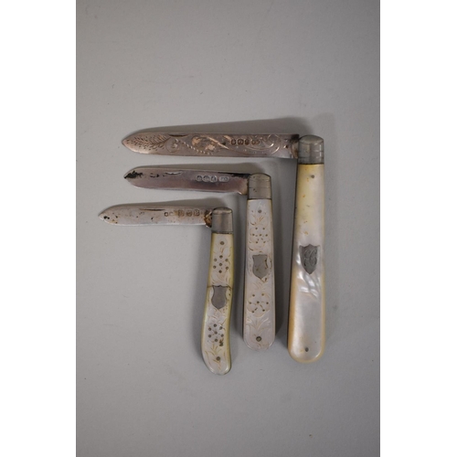 34 - Three silver bladed mother of pearl handled fruit knives.