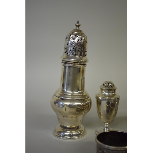 54 - A selection of silver items, to include: a caster; condiments; and napkin holders, 362g weighable.... 