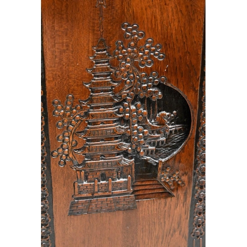 1160 - A pair of Oriental carved hardwood bedside cupboards, 37cm wide. 