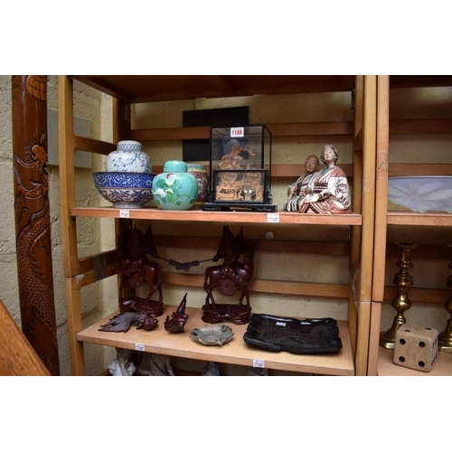 1188 - A mixed group of Chinese and other Oriental items. (two shelves)