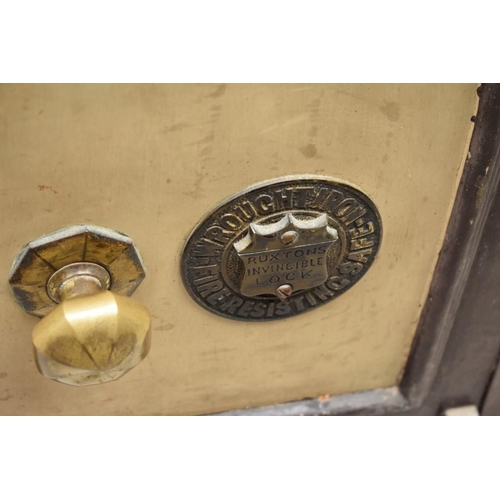 1203 - A Victorian safe, the escutcheon inscribed 'Ruxtons Invincible Lock', 38cm wide, with one key.... 