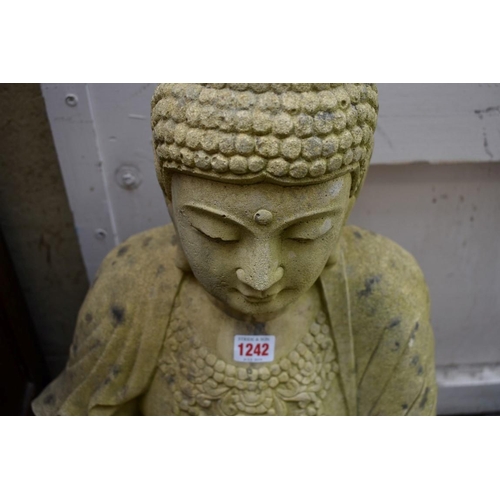 1242 - A large composition stone Buddha, 70cm high.