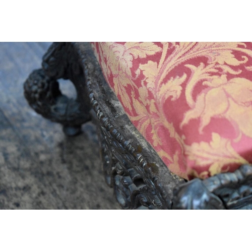 1424 - A 19th century Anglo-Indian carved and pierced hardwood foot stool.