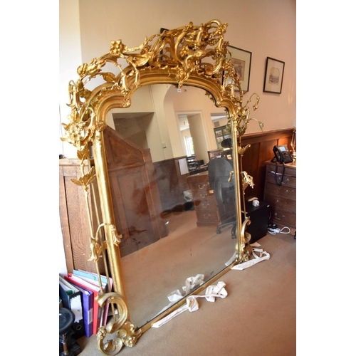 1432 - A very large and impressive 19th century carved gilt framed overmantel mirror, 187.5 x 171cm.... 