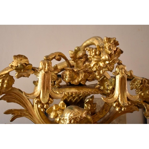 1432 - A very large and impressive 19th century carved gilt framed overmantel mirror, 187.5 x 171cm.... 